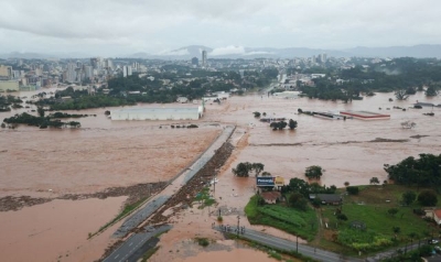 Dozens dead and roads turned into rivers as Brazil hit by record-breaking floods