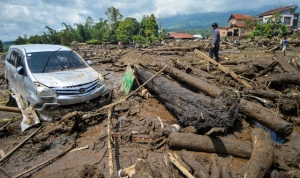 Cold lava landslides and flash floods leave 43 dead in Indonesia after heavy rains