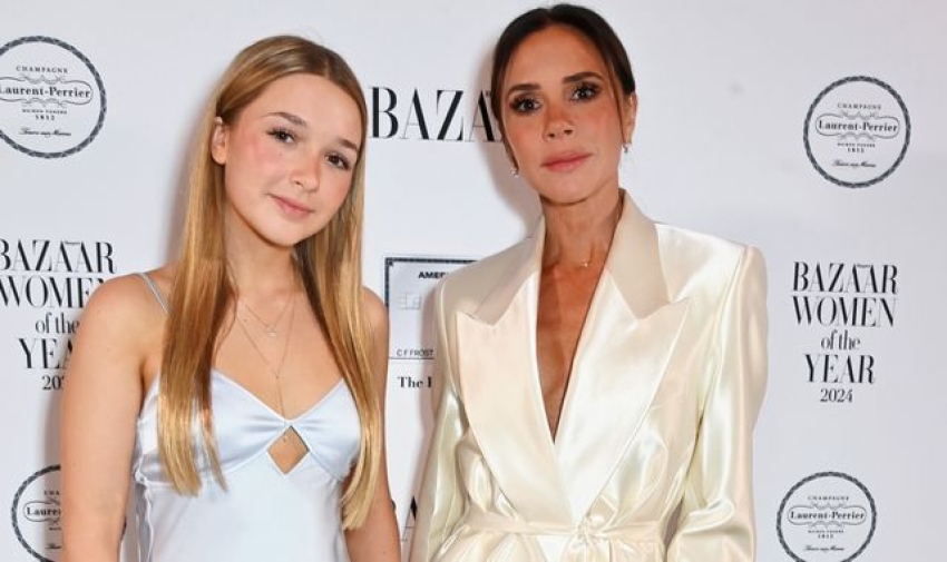 Victoria Beckham presented with a Harper's Bazaar women of the year prize from daughter Harper