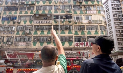 Hong Kong fire: Five dead and 27 injured after blaze in apartment building 