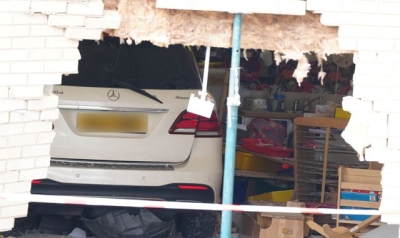 Mercedes car crashes through primary school wall before stopping in classroom
