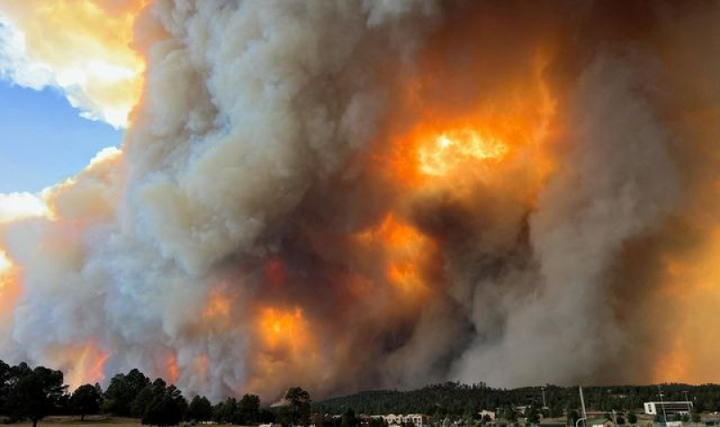 Thousands flee their homes due to wildfires as extreme heat grips parts of the US