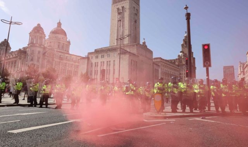 Liverpool riots: First group of people involved in riots appear in court - with one swearing as he was taken away