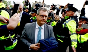 Former Democratic Unionist Party leader Sir Jeffrey Donaldson arrives at court charged with rape
