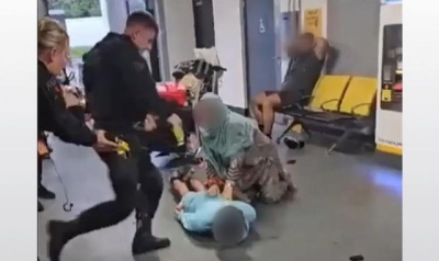 Police watchdog opens criminal investigation into officer filmed kicking man at Manchester Airport