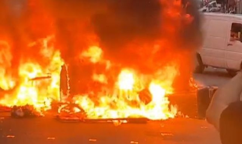 Man charged after bus set on fire during Leeds riots as five more arrested