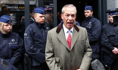 Nigel Farage says he made &#039;discreet exit&#039; from conference before &#039;police storm&#039; building - as he hits out at cancel culture