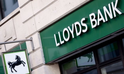Lloyds profits plunge following record year